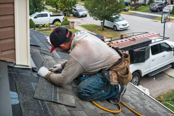 Professional Roofing technician working in Hempstead, NY